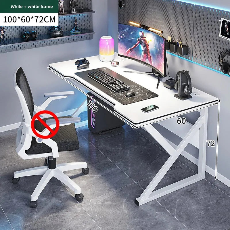 Gaming desk setup with a chair, monitor, and other accessories in a room.