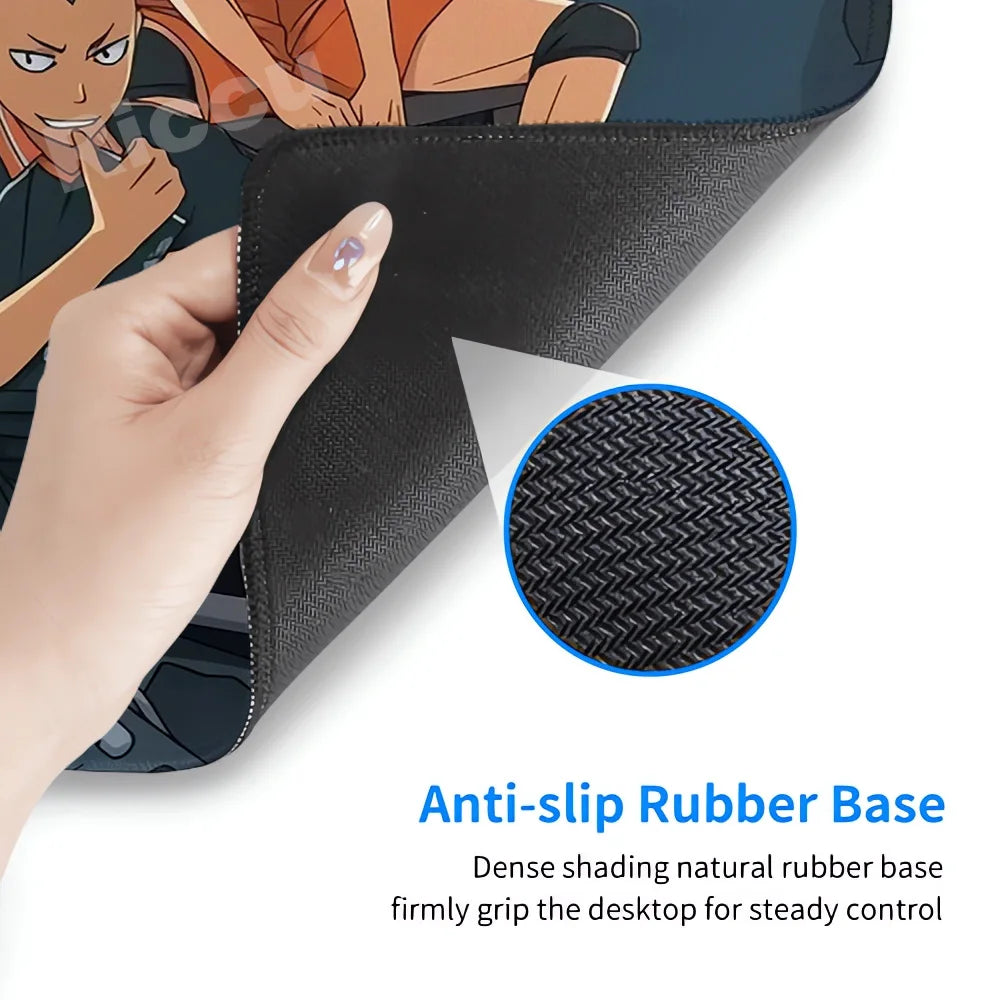 Mouse pad with hand holding it and close-up of anti-slip rubber base