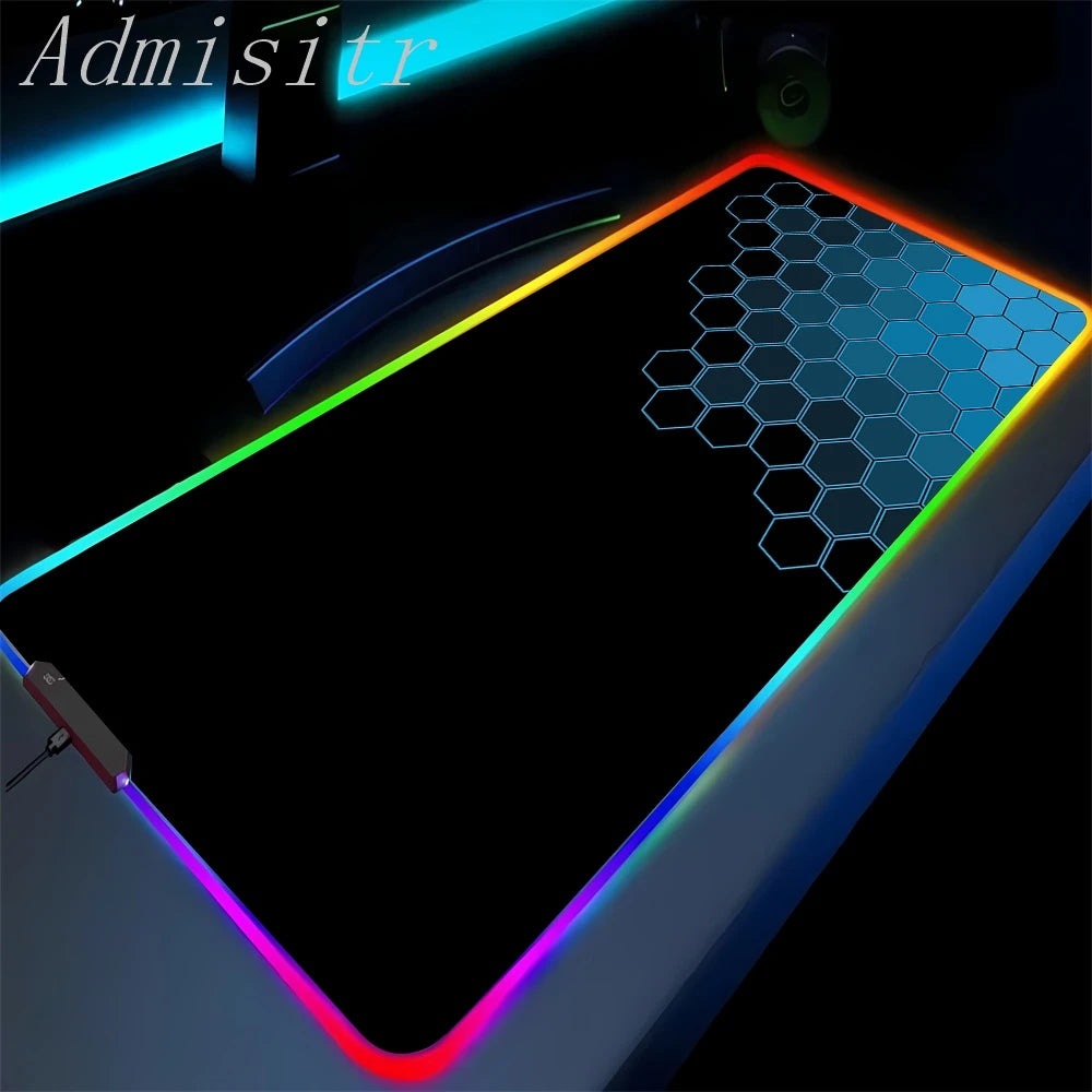 Colorful LED lighted mouse pad with geometric design on a dark background