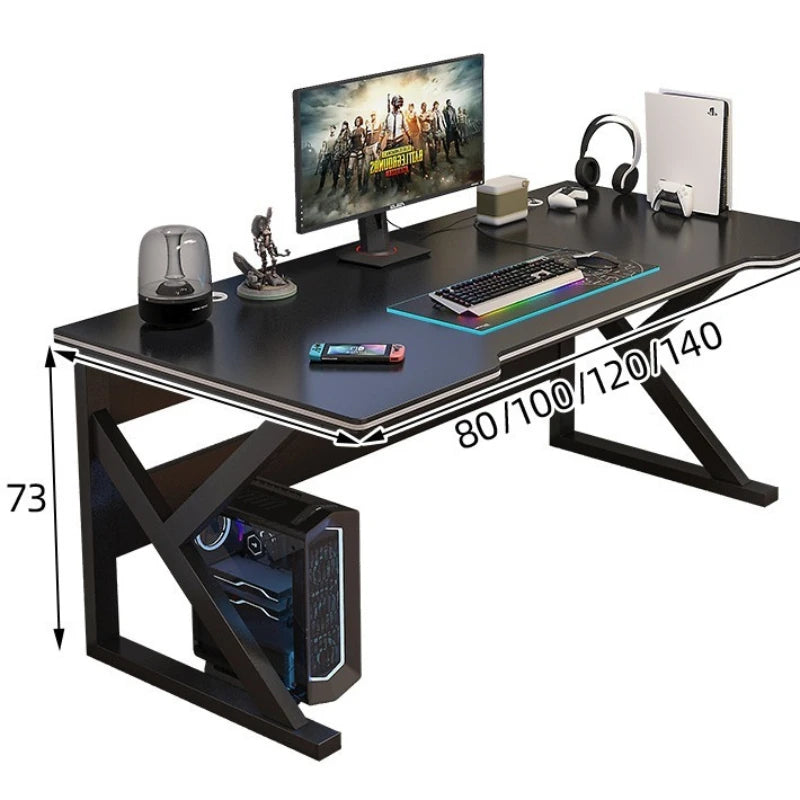 Gaming desk with computer setup, including monitor, keyboard, and speakers, on a white background.