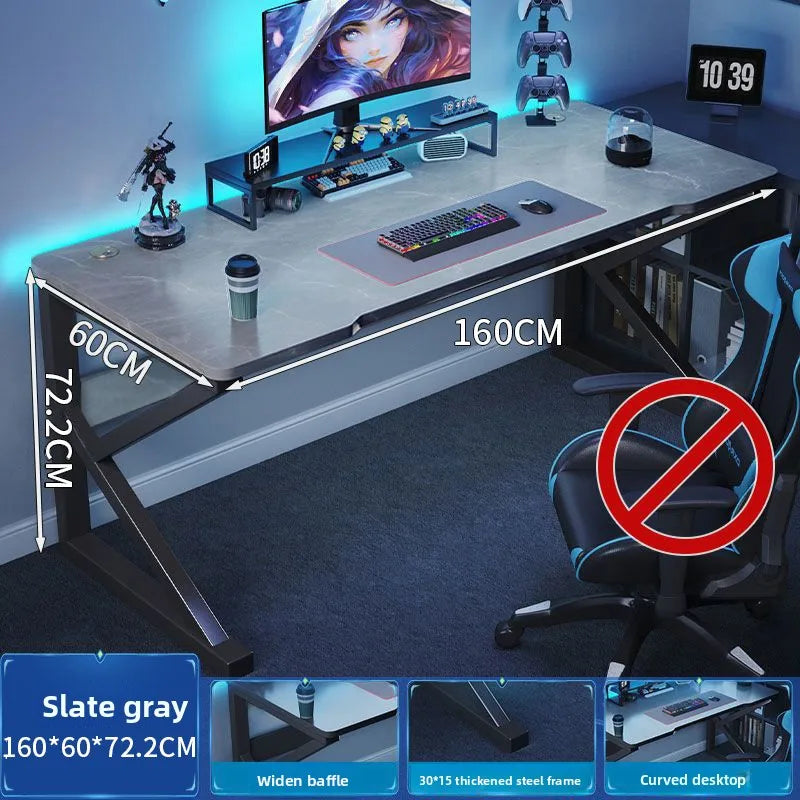 Gaming desk with computer setup, dimensions indicated, and a no-smoking symbol.