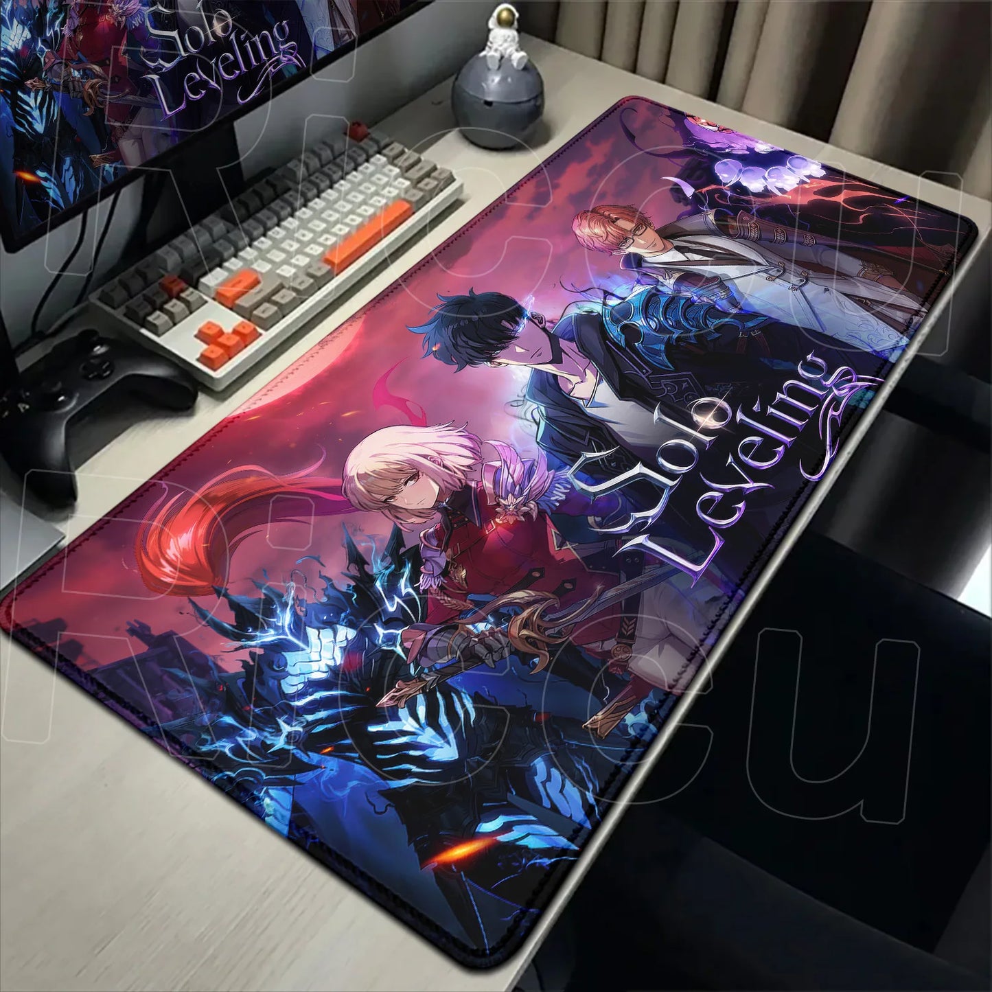 Desk setup with a large mouse pad featuring an anime design.