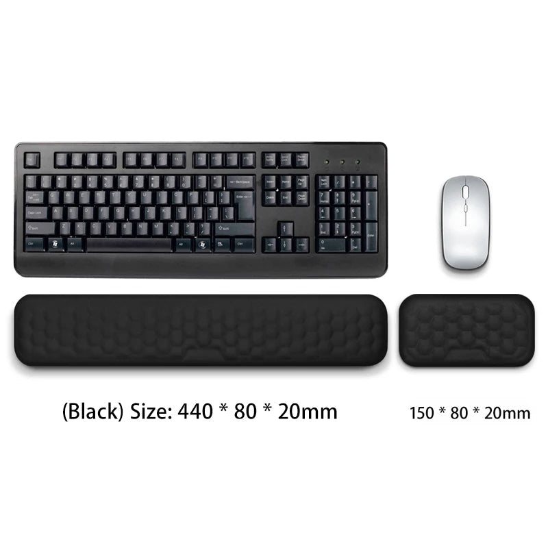 Black keyboard, mouse, and wrist rests on a white background with dimensions displayed.
