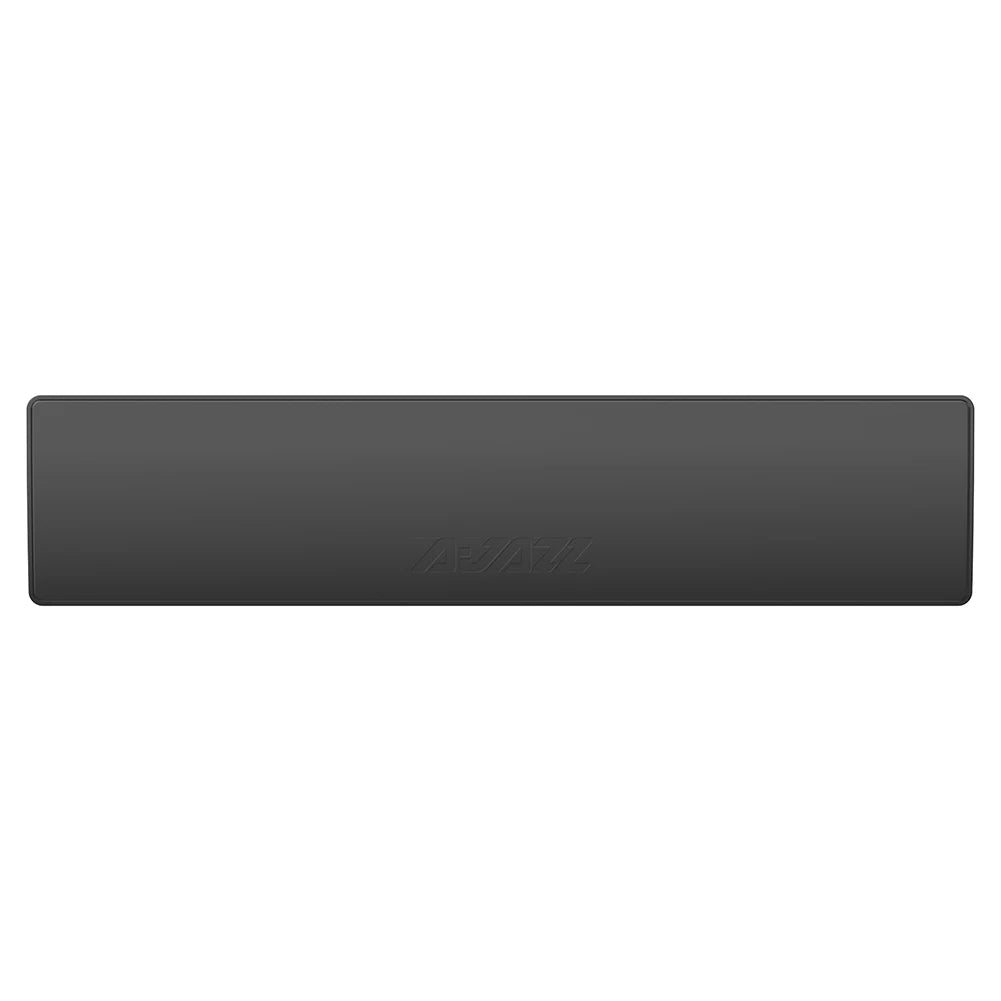 Black keyboard wrist rest on a white background