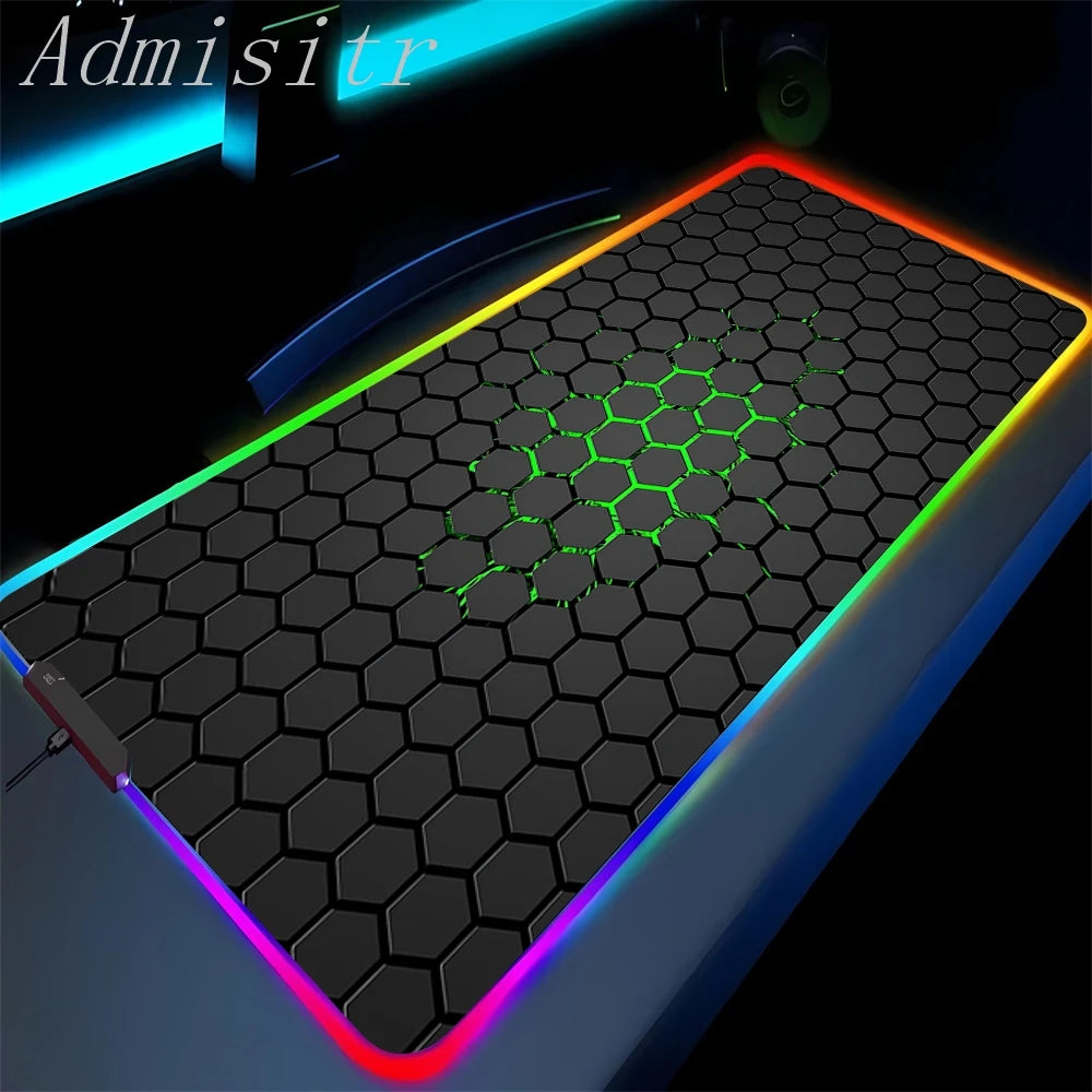 Hexagonal patterned mouse pad with colorful LED edges on a dark background