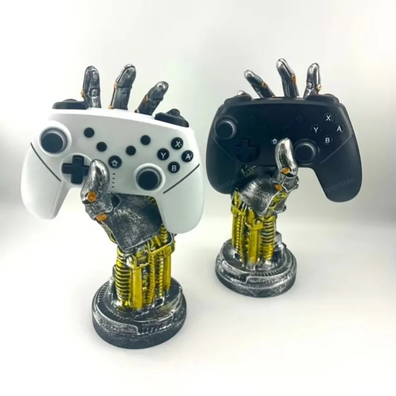 Two mechanical hand sculptures attached to gaming controllers on a white background