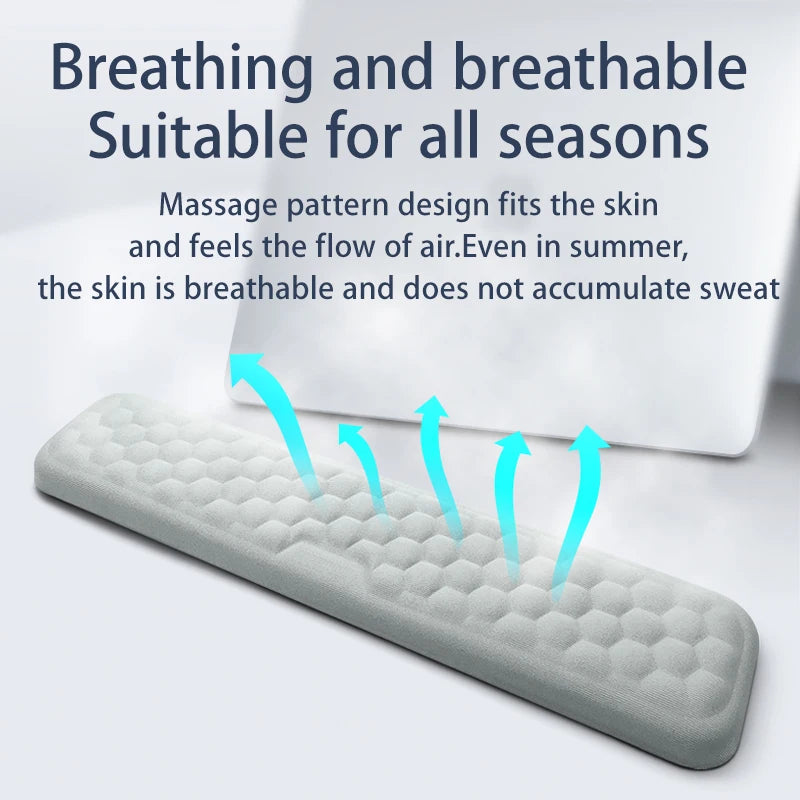 Gray mattress topper with text highlighting breathability and massage pattern design on a light gray background.