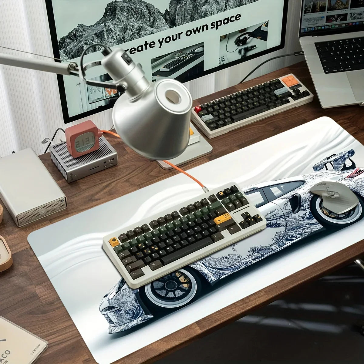 Desk setup with keyboard, mouse, and monitor on a desk.