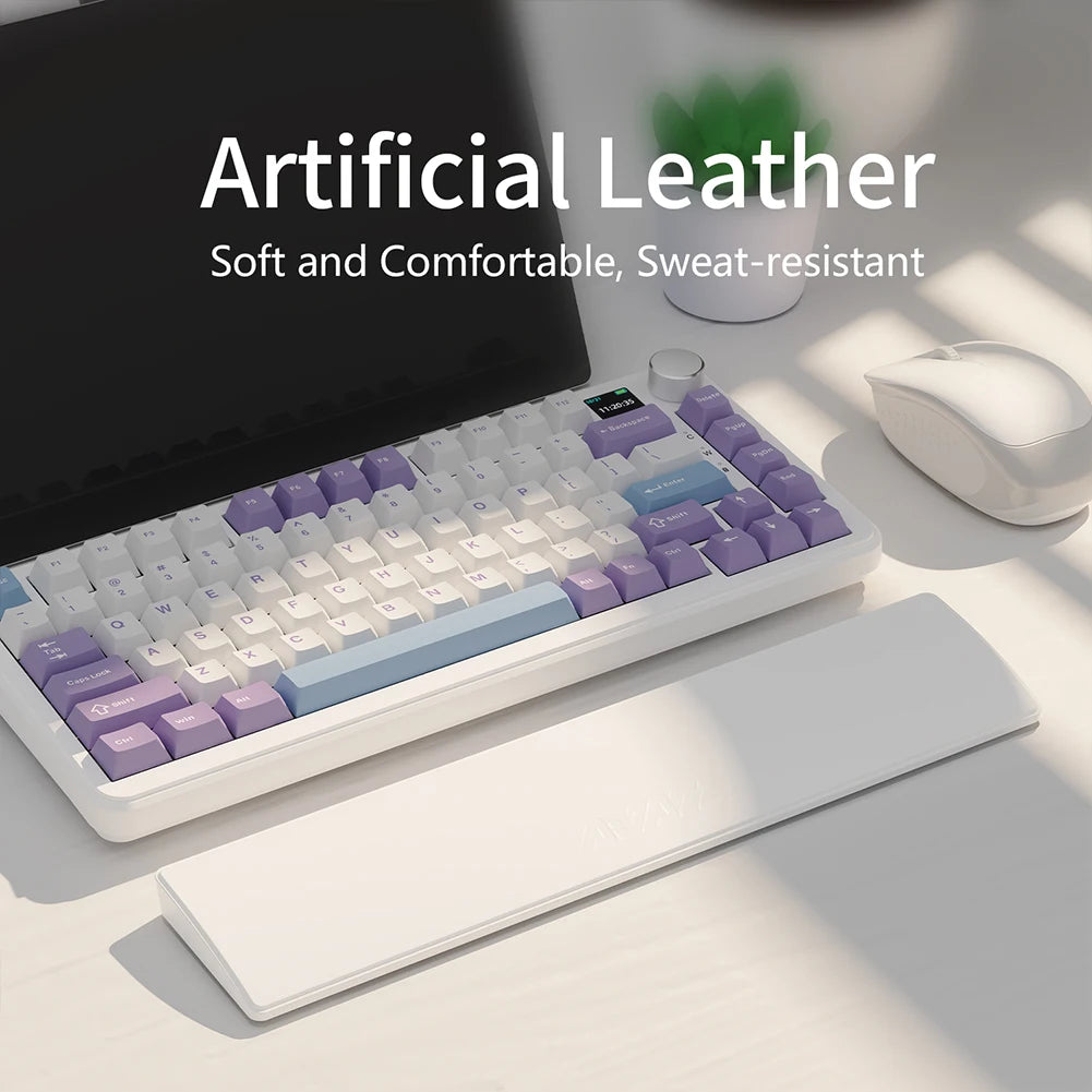 Mechanical keyboard with artificial leather keycaps on a desk with a laptop and mouse.