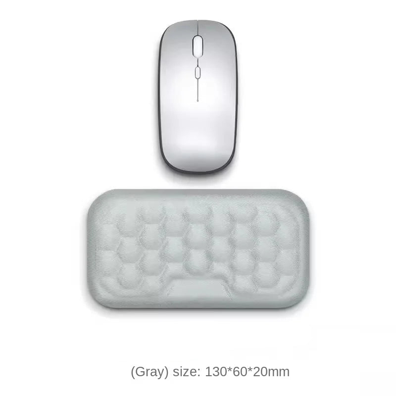Gray computer mouse and mouse pad on a white background