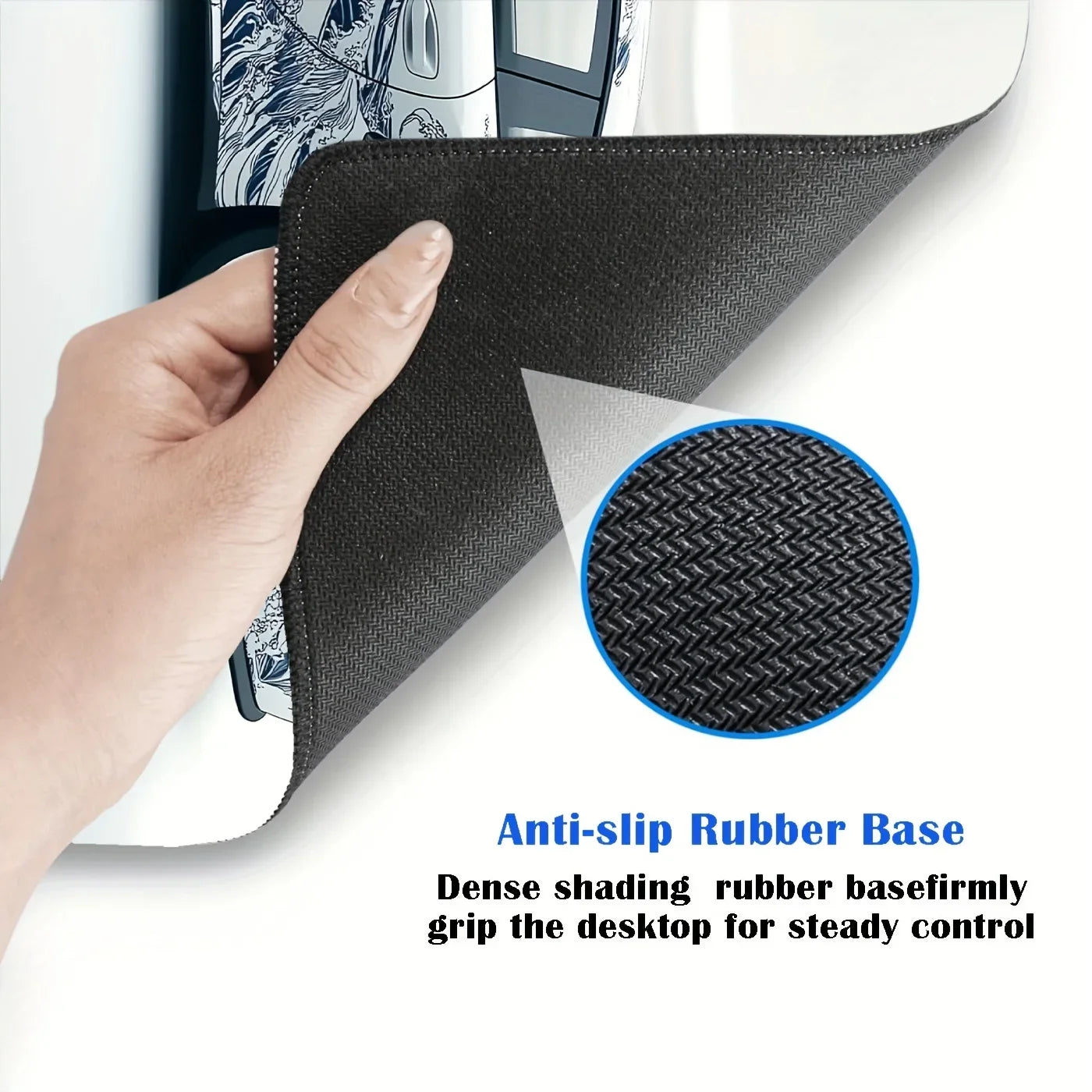 Hand holding a black mouse pad with an inset showing the anti-slip rubber base.