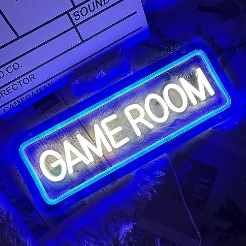 Neon sign that reads 'GAME ROOM' on a clapperboard background