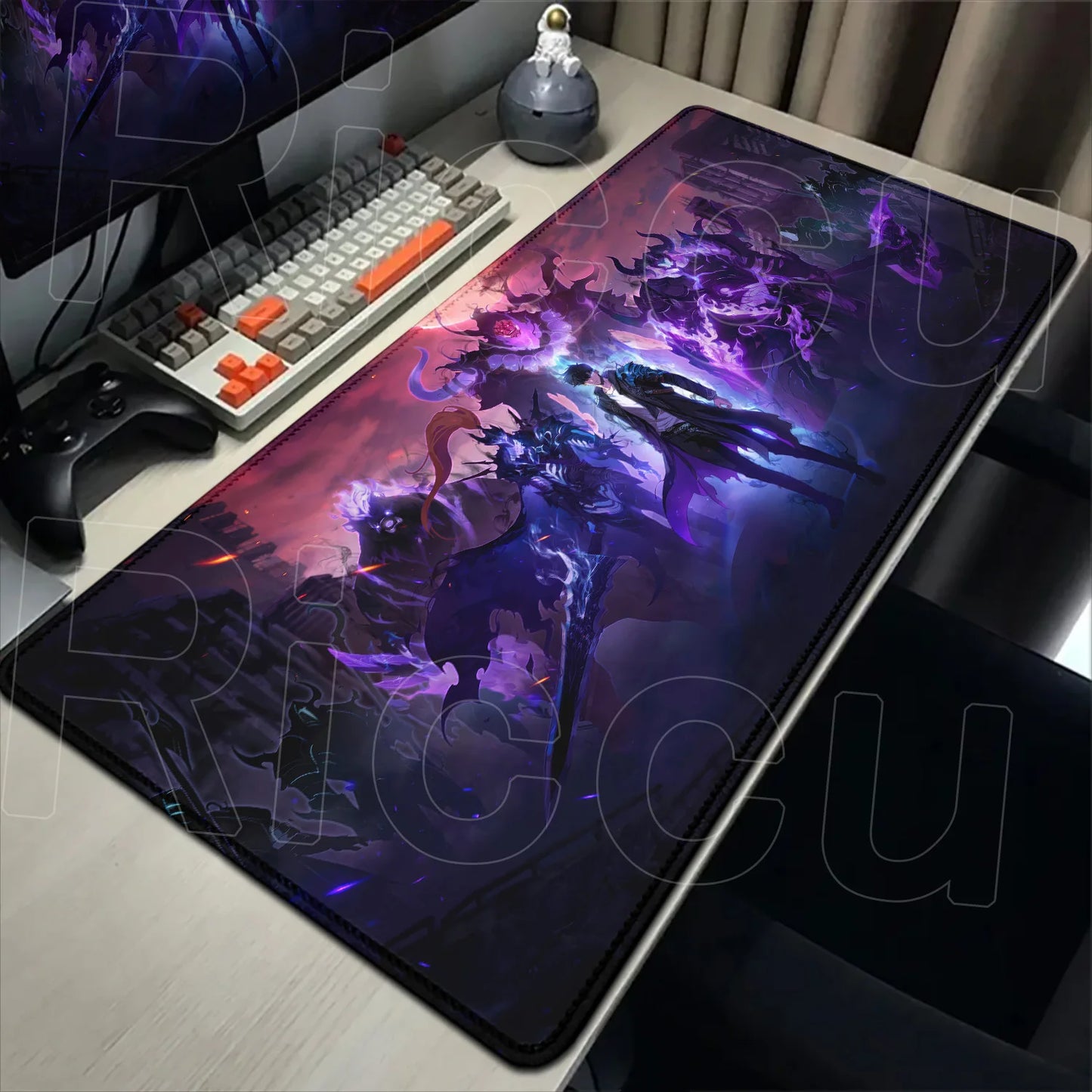Gaming desk setup with a large mouse pad featuring anime-style artwork.