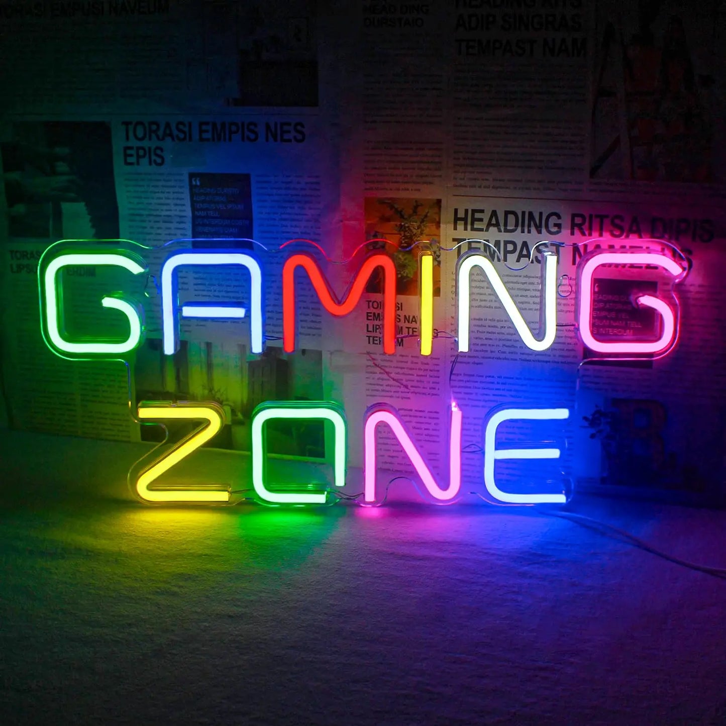 Neon sign with 'Gaming Zone' text on a dark background