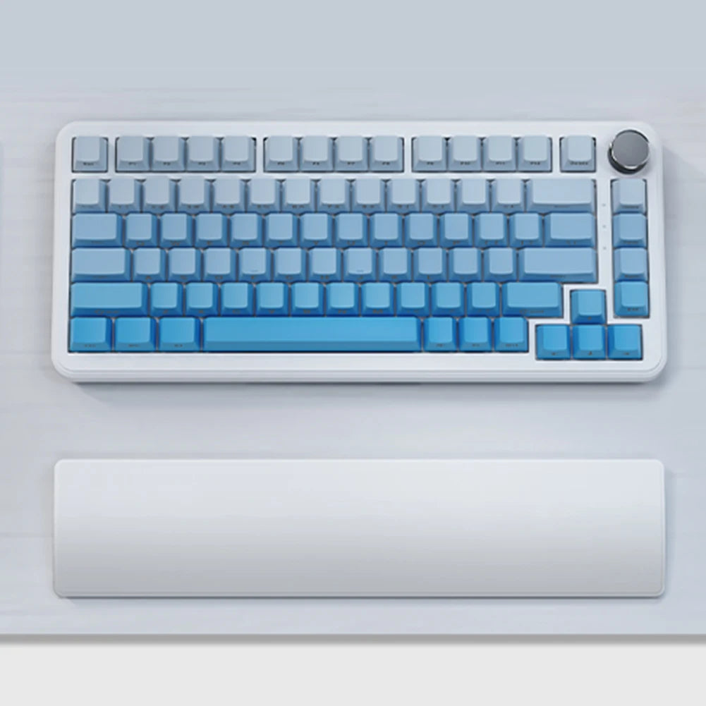 Keyboard with blue and gray keys on a light gray background
