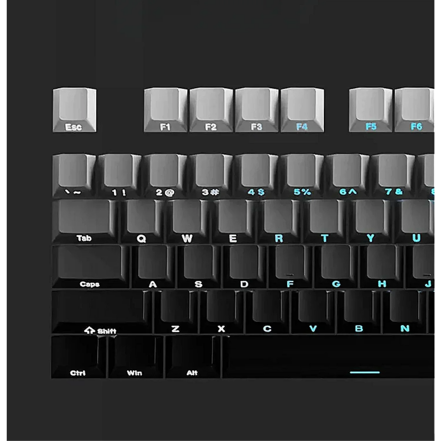 Close-up of a mechanical keyboard with labeled keys on a black background