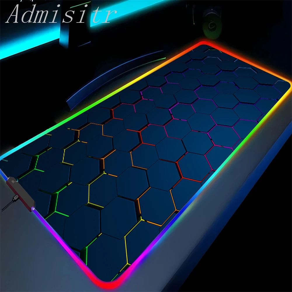 Gaming mouse pad with hexagonal grid design and colorful border on a dark background