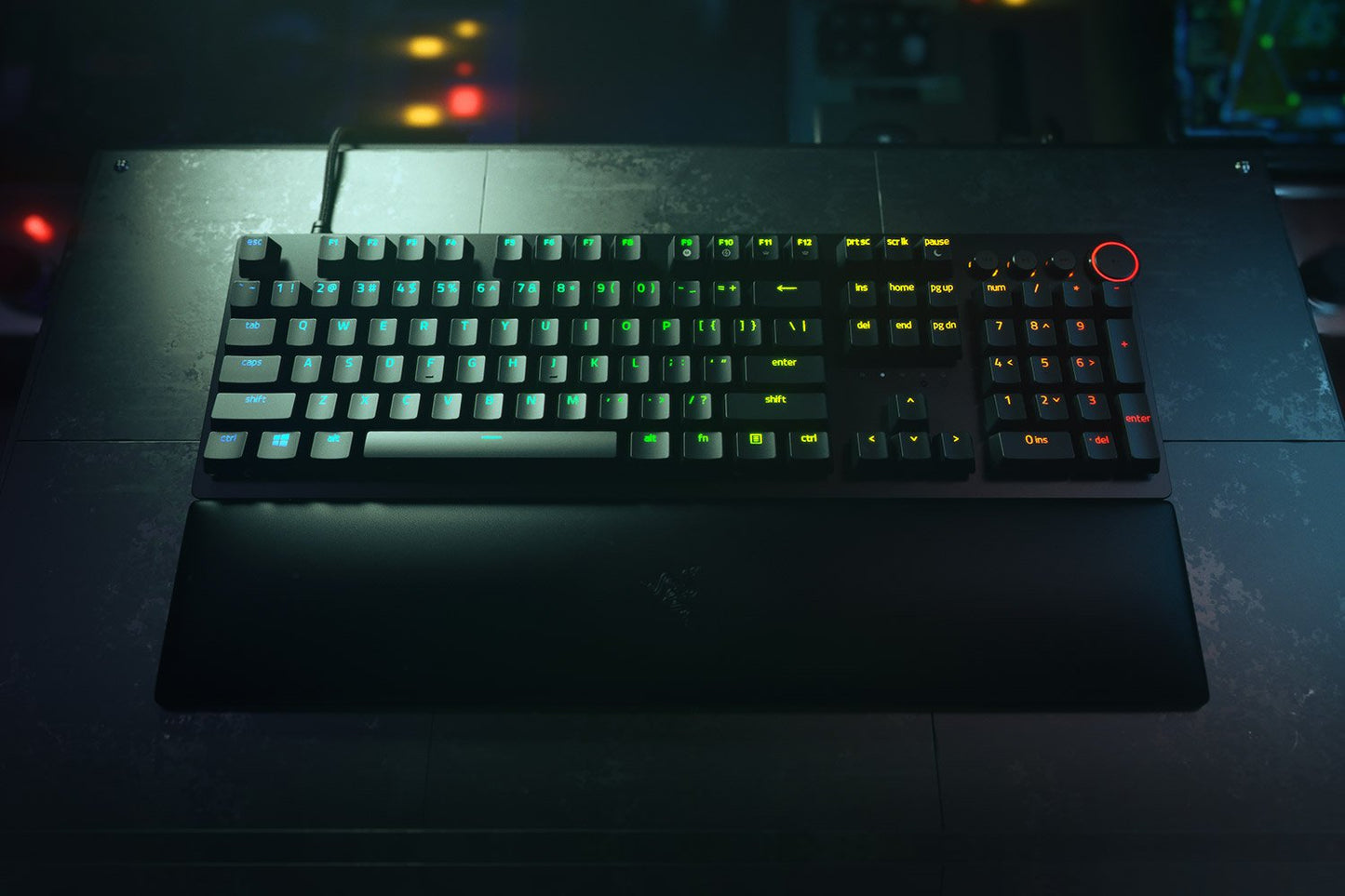 Gaming keyboard with RGB lighting on a dark surface