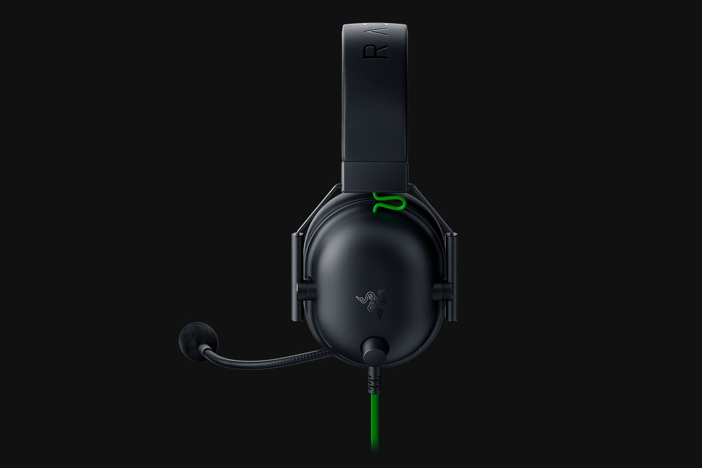 Black gaming headset with microphone on a black background