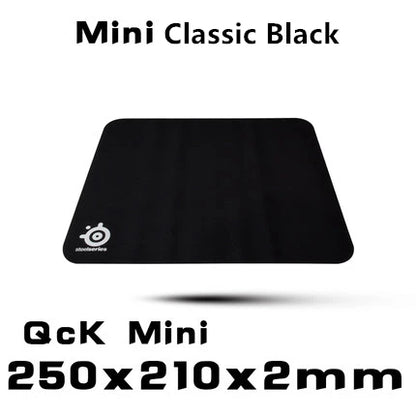 Black mouse pad with a logo on a white background, labeled 'Mini Classic Black QcK Mini'.