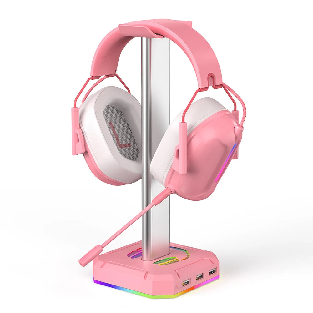 Pink gaming headset with a charging stand on a white background