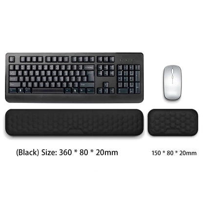Black keyboard, mouse, and wrist rest on a white background with dimensions displayed.