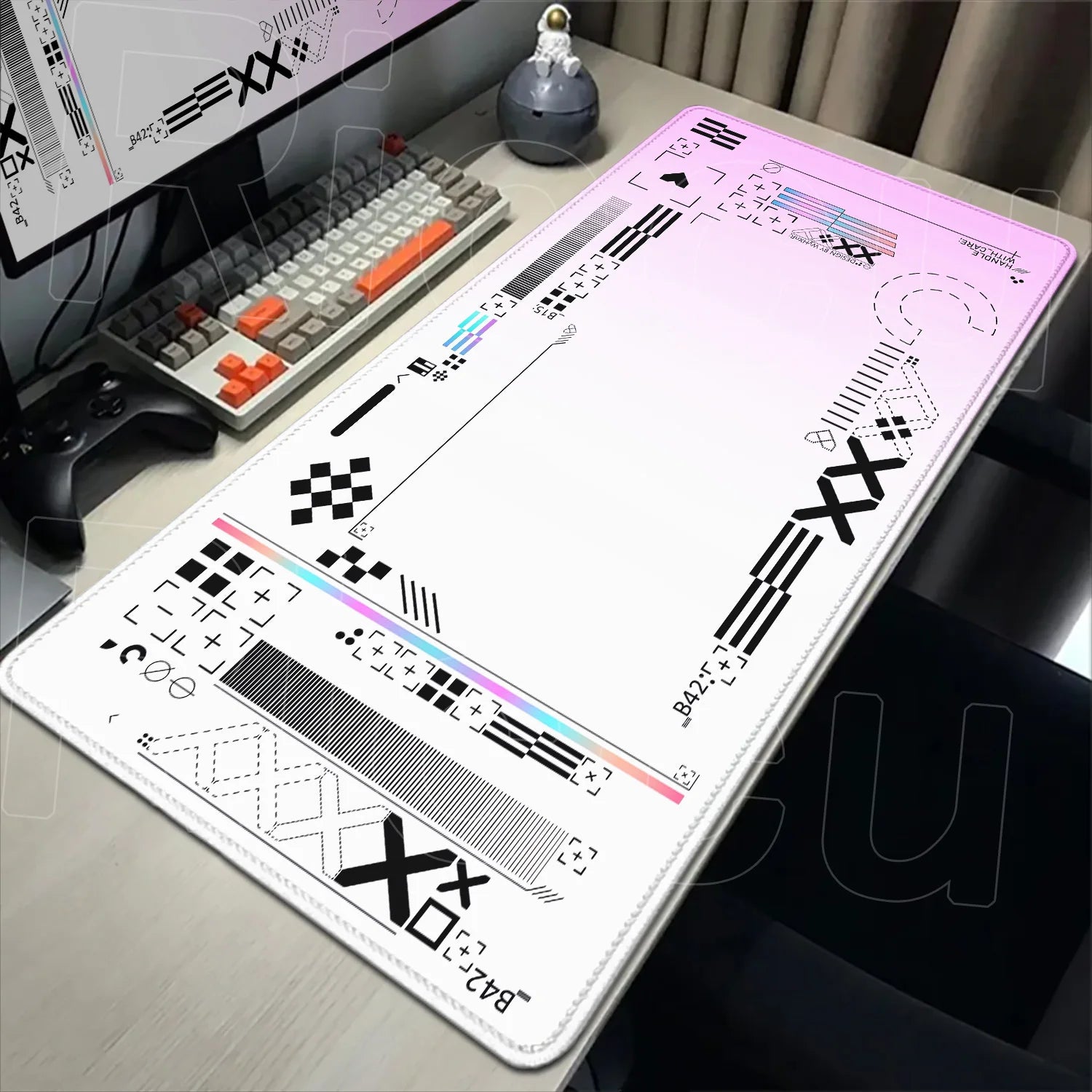 Large desk mat with geometric patterns on a desk setup