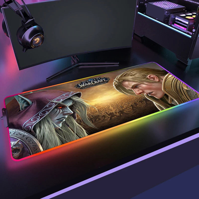 Gaming setup with a 'World of Warcraft' mouse pad featuring two characters.