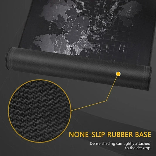 Black desk mat with world map design and close-up of non-slip rubber base on a dark background