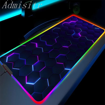 Gaming mouse pad with hexagonal pattern and colorful lighting on a dark background