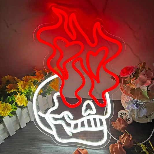 Neon sign of a skull with red flames on a decorative background with flowers.