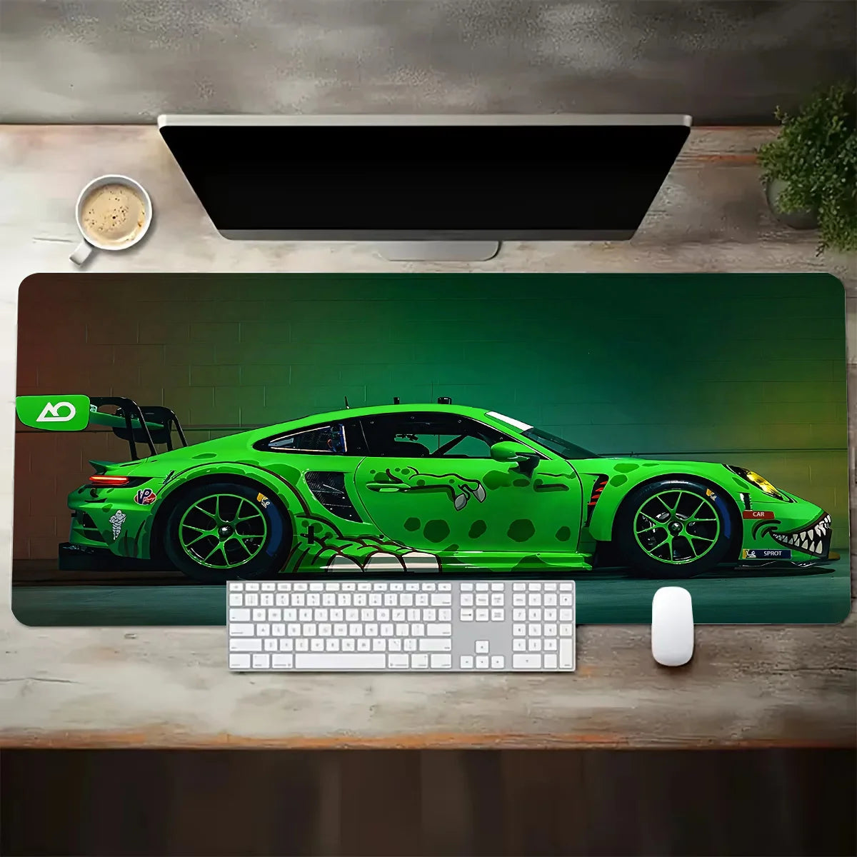 Green sports car on a desk mat with keyboard and mouse