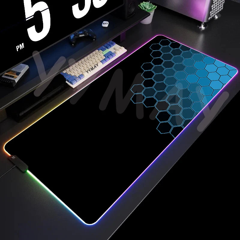 Large gaming mouse pad with RGB lighting on a desk setup