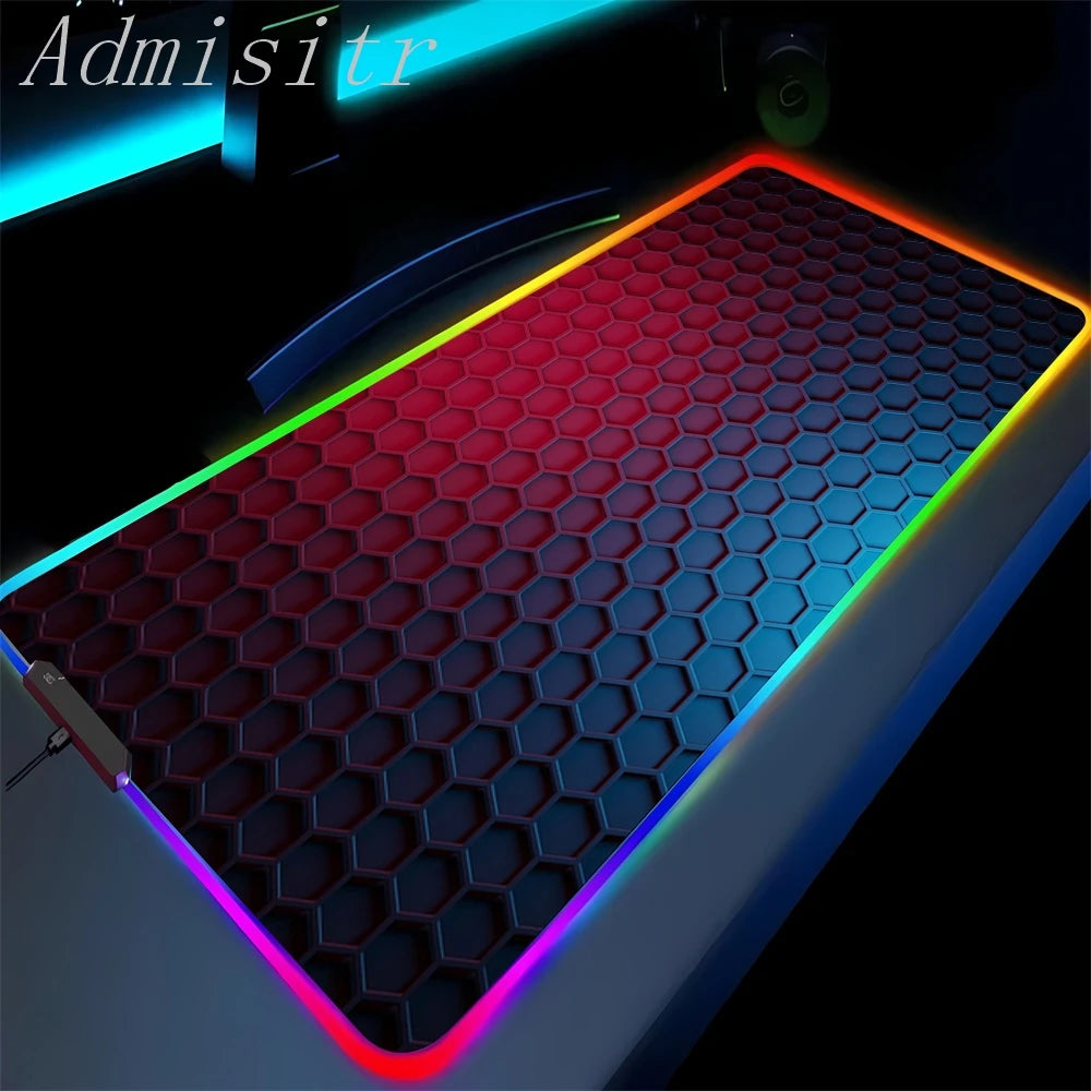 Gaming mouse pad with honeycomb texture and colorful LED lighting on a dark background.