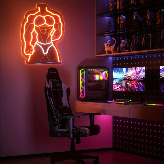 Gaming setup with neon sign, chair, and computer monitors in a dark room.