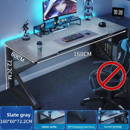 Gaming desk with computer setup, dimensions indicated, and a no-smoking symbol.
