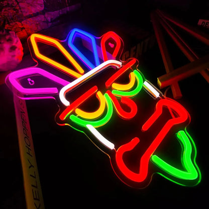 Neon sign shaped like a Texas state with colorful lights on a dark background