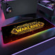 World of Warcraft mouse pad with gaming setup on a desk
