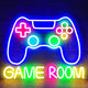 Neon sign shaped like a gaming controller with 'GAME ROOM' text on a dark background