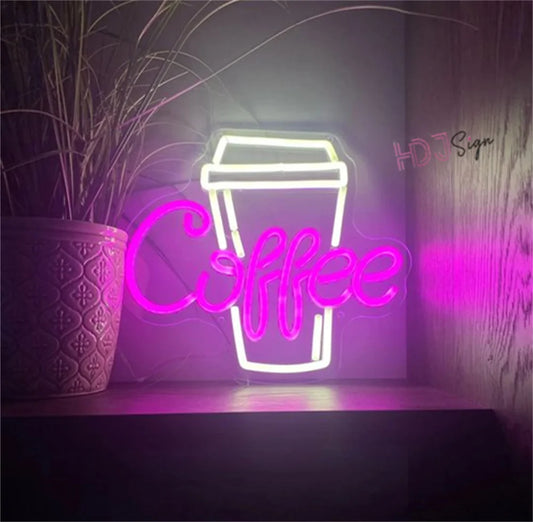 Neon sign with a coffee cup and 'Coffee' text on a dark background