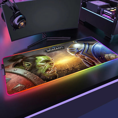 Gaming mouse pad with 'World of Warcraft' design on a desk setup.