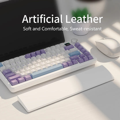 Mechanical keyboard with artificial leather keycaps on a desk with a laptop and mouse.