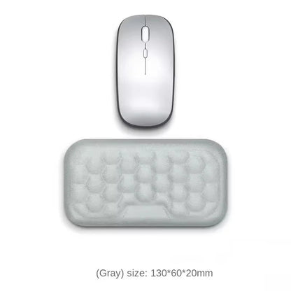 Gray computer mouse and mouse pad on a white background