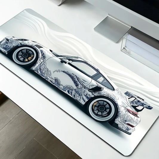 Car-shaped desk mat on a white surface