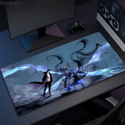 Desk setup with a large mouse pad featuring an artistic design of a person and dragon.