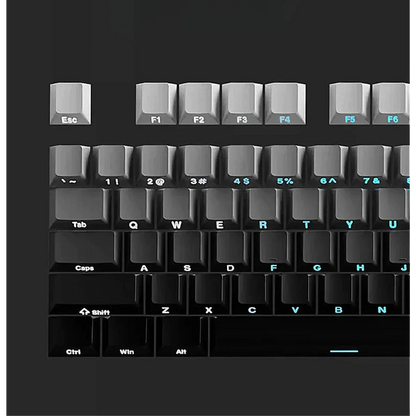 Close-up of a mechanical keyboard with labeled keys on a black background