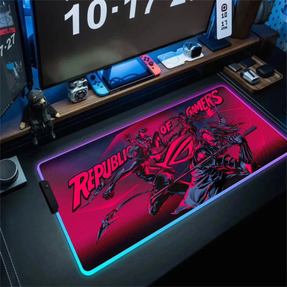 Gaming desk setup with a Republic of Gamers mouse pad