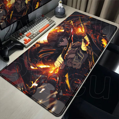 Anime-themed mouse pad on a desk with computer setup