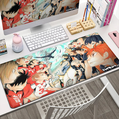 Anime-themed desk setup with a large mouse pad featuring character designs.