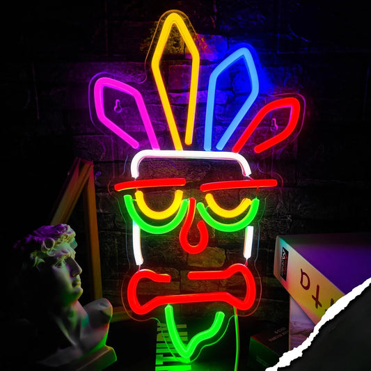 Neon sign of a tiki character with colorful glasses and headdress on a dark background